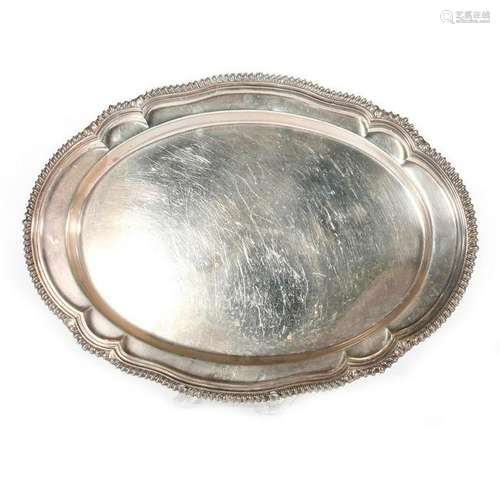 A sterling silver tray.