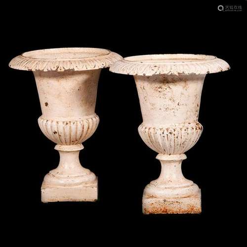 Pair of cast iron vase/capitals.