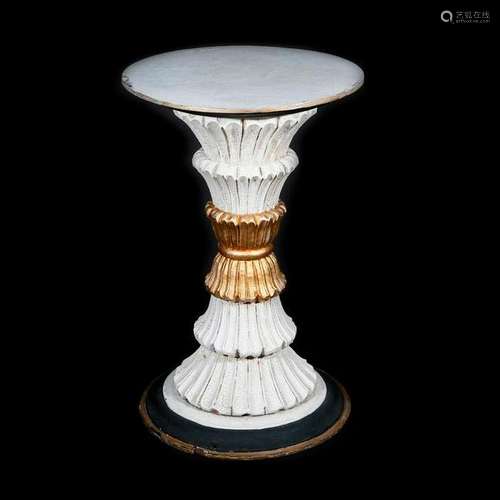 A neoclassical style pedestal table.