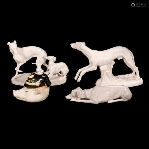 Three porcelain dogs and pig.