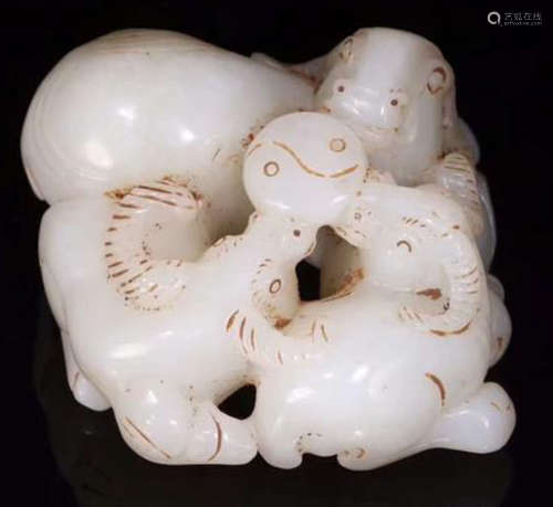 A HETIAN JADE CARVED SHEEP SHAPED PENDANT