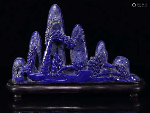 A LAZULI CARVED MOUNTAIN SHAPED PEN SHELF