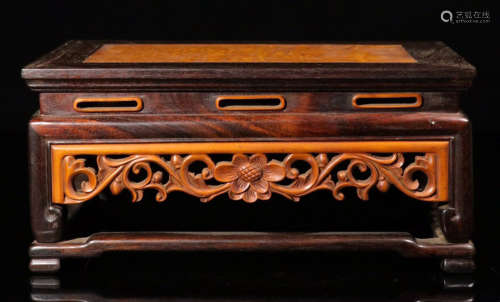 A ZITAN WOOD CARVED WRAPPED FLOWER PATTERN STAGE