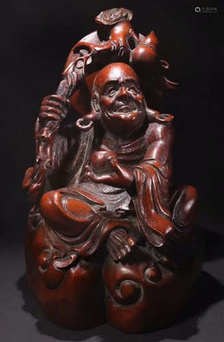 A BAMBOO CARVED LUOHAN BUDDHA