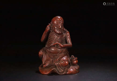 A BAMBOO CARVED LUOHAN BUDDHA