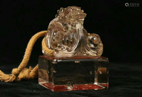 A CRYSTAL CASTED DRAGON PATTERN SEAL