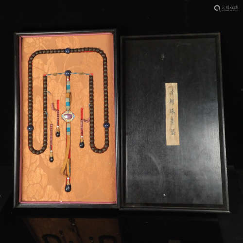 A CHENXIANG WOOD CARVED BEADS STRING NECKLACE