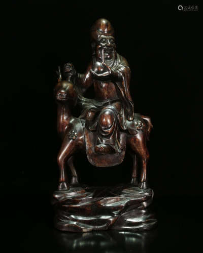 A CHENXIANG WOOD CARVED FIGURE SHAPED PENDANT