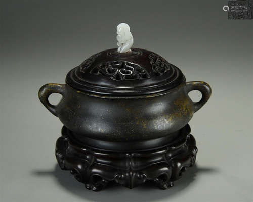 A BRONZE TWO-EAR CENSER