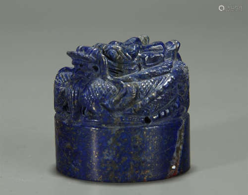 A LAPIS LAZULI CARVED BEAST SEAL