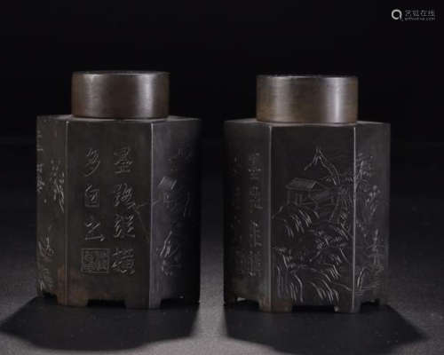 A PAIR OF TIN CALLIGRAPHY AND LANDSCAPE CARVED TEA LEAF JARS