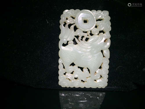 A HETIAN JADE TABLET OF BEAST CARVING