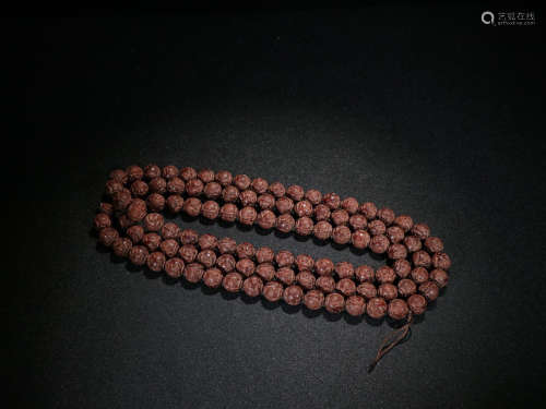 A CHENXIANG WOOD NECKLACE WITH 108 BEADS
