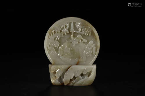 A HETIAN JADE ORNAMENT CARVED IN LAD WITH ELEPHANT