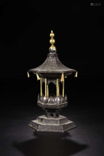 A GILT SILVER CANDLE HOLDER