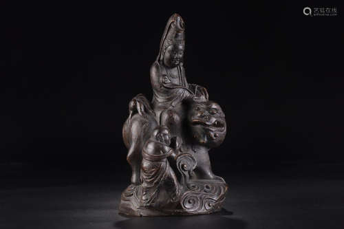 A BAMBOO FIGURE OF GUANYIN AND KID