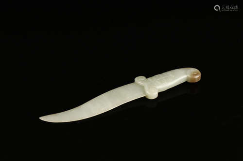 A HETIAN JADE DAGGER SHAPED PENDANT