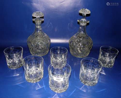Set of six cut glass heavy tumblers with ovolo decoration and two cut glass spirit decanters (8)