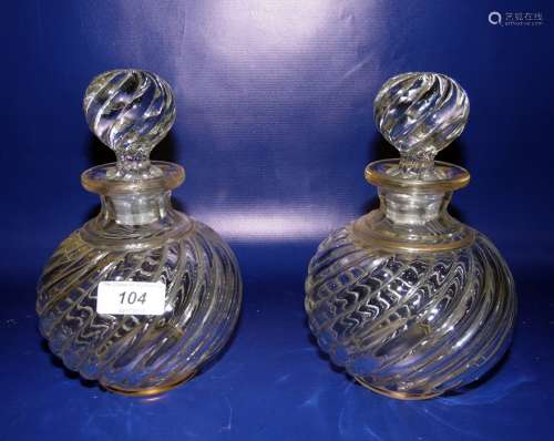 Pair Victorian gilt clear decanters each with wrythen spherical stopper, gilt borders and wrythen