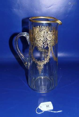 Large cut and gilt glass jug, tapering with floral and festoon gilt decoration, panelled lower body,