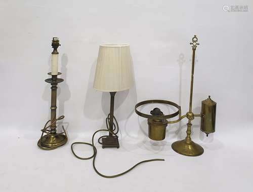 Brass oil lamp with single scroll arm and counterbalance on cylindrical stem, two other various