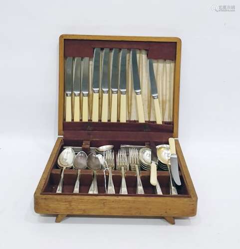Service of Friar EPNS table flatware with angular embossed handles, in oak canteen