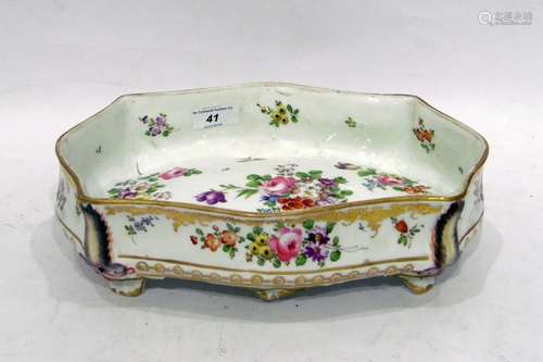 Nantgarw style porcelain dish, rectangular with ogee shape, bombe sides and raised on four