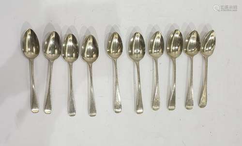 Matched set of nine silver spoons, Hanover feather-edged pattern, assorted dates and makers,