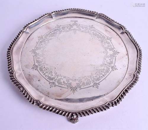 A SOLID SILVER SALVER BY ATKIN BROTHERS, formed with