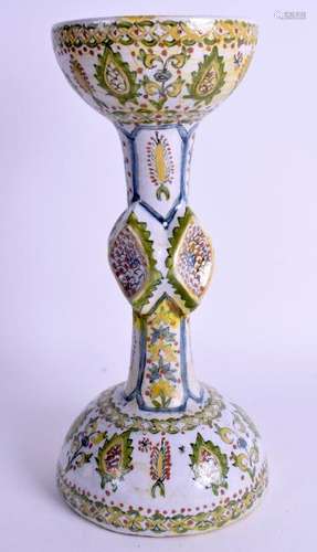 A RARE TURKISH FAIENCE KUTAHYA FAIENCE CANDLE HOLDER.