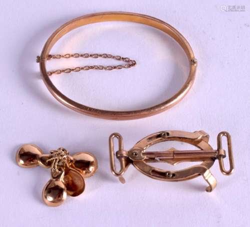 A 14CT GOLD CHILD'S BANGLE, together with two other