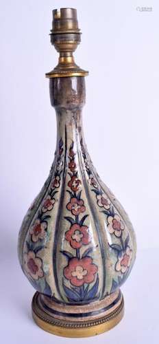 A 19TH CENTURY PERSIAN TURKISH FAIENCE GLAZED BOTTLE