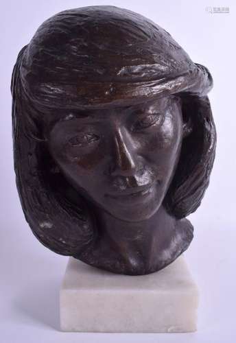 A 1970S BRONZE BUST OF A FEMALE upon an onyx base. 34