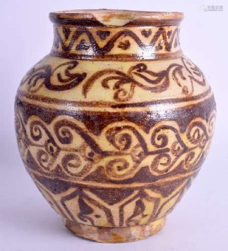 AN ISLAMIC MIDDLE EASTERN POTTERY VASE. 18 cm x 13 cm.