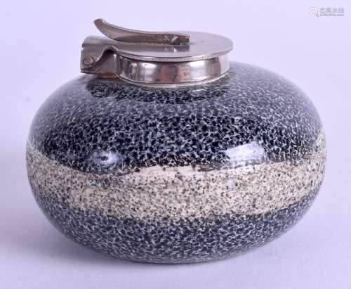 A miniature curling stone inkwell, the coloured ceramic