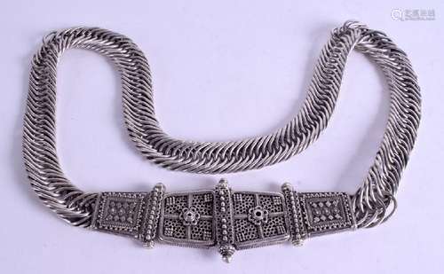 A SOLID SILVER EASTERN BELT, decorated with foliage. 80