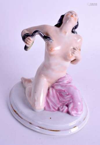 AN UNUSUAL 1950S CONTINENTAL PORCELAIN FIGURE OF A NUDE