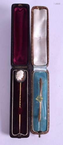 A VICTORIAN STICK PIN INSET WITH A CARVED CAMEO,