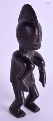 AN AFRICAN TRIBAL CARVED HARDWOOD FERTILITY FIGURE. 19