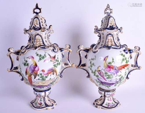 A PAIR OF 19TH CENTURY FRENCH PORCELAIN VASES AND