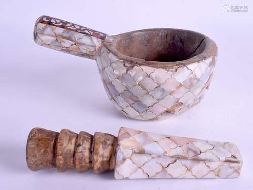 AN INDIAN MOTHER OF PEARL AND TORTOISESHELL PESTLE AND