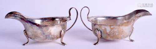 A PAIR OF SOLID SILVER SAUCEBOATS BY EMILE VINER OF