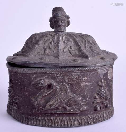 A George III oval cast lead tobacco box and cover. 13