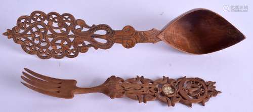 TWO UNUSUAL ISLAMIC MIDDLE EASTERN WOOD SERVING TOOLS.