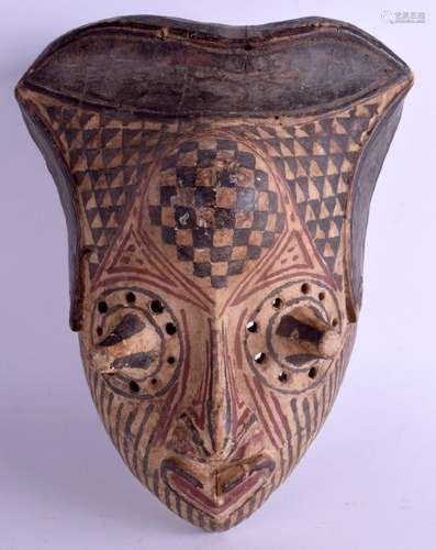 AN UNUSUAL TRIBAL AFRICAN POLYCHROMED WOOD MASK