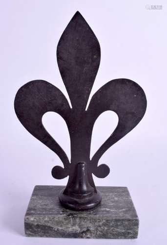 A bronze fleur de lys and green marble presse papier.