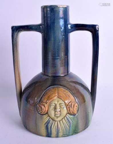 AN UNUSUAL TWIN HANDLED ARTS AND CRAFTS POTTERY VASE