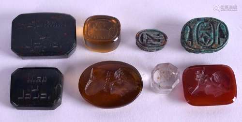 EIGHT ANTIQUE SEALS in various forms. (8)