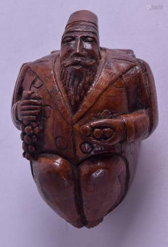 AN 18TH/19TH CENTURY CARVED TREEN SNUFF BOX in the form