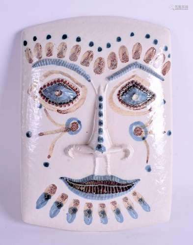 A RETRO 1960S POTTERY PAINTED MASK PLAQUE by P Stroud